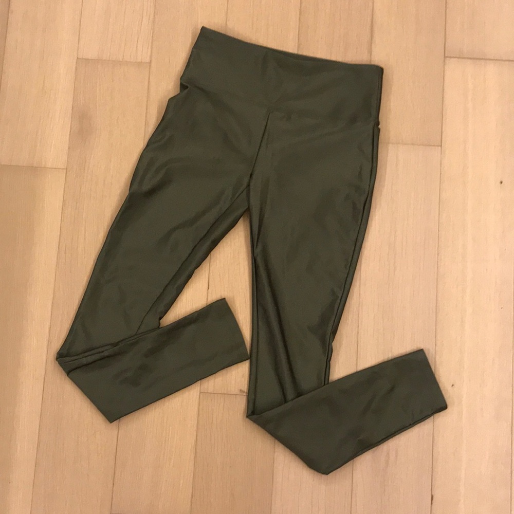 Luminescent shiny green leggings. Never worn.